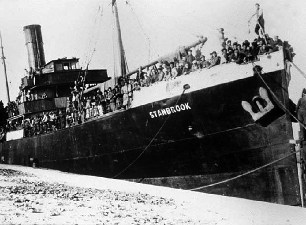 The old ship SS Stanbrook in the port of Alicante with 2,638 refugees aboard