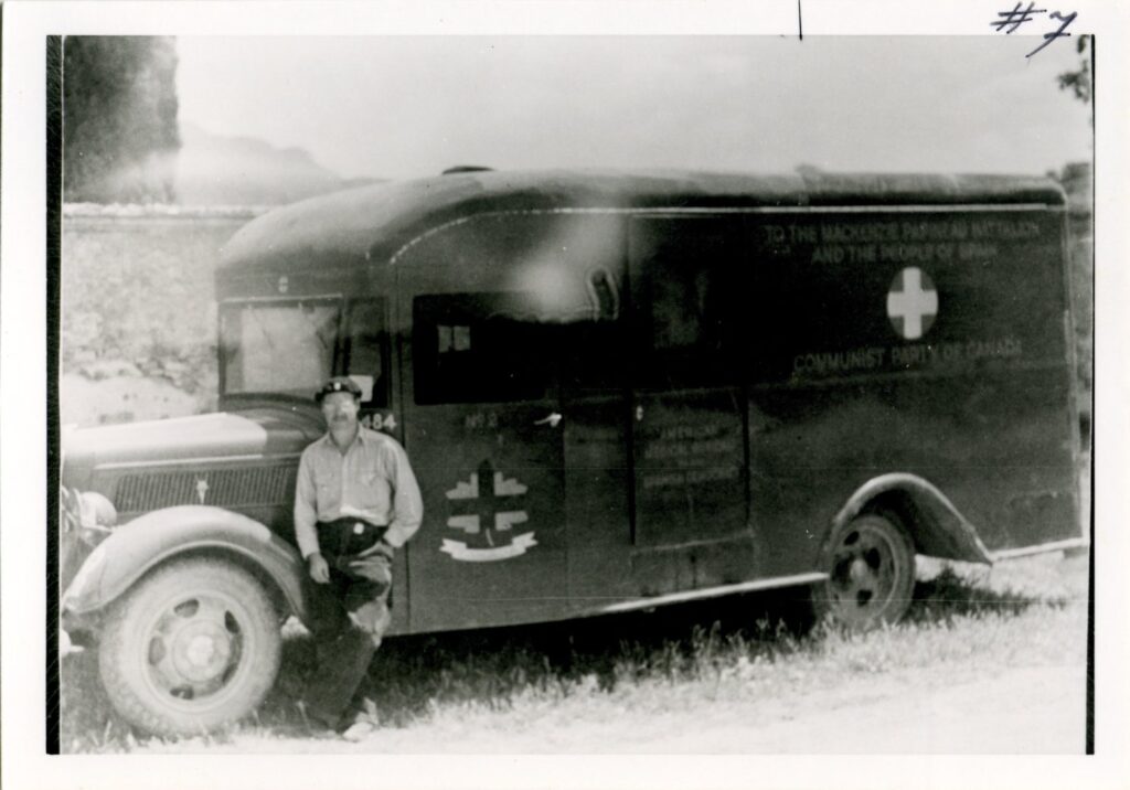 Walter Schuetrum with Mac Pap Ambulance, 1938. Photo: no known copyright. From (with permission): https://spanishcivilwar.ca/islandora/object/islandora:e479d7de-c52e-4579-9189-792b19a65013#page/1/mode/1up