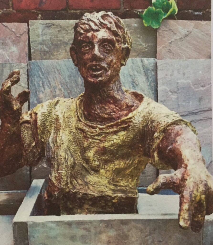 Blokadebrydere til Spanien: Frank Caseys bronzefigur 'The Warning Shout' ('Advarselsråbet') til monumentets top
